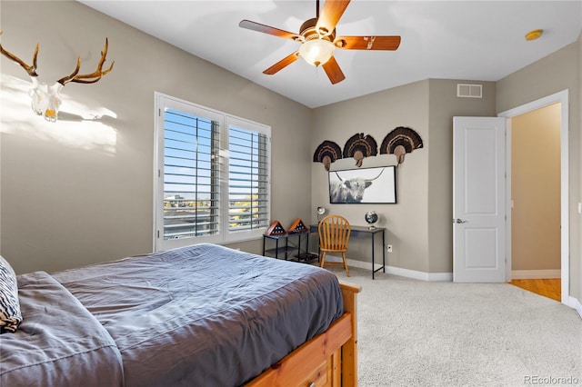 carpeted bedroom with ceiling fan