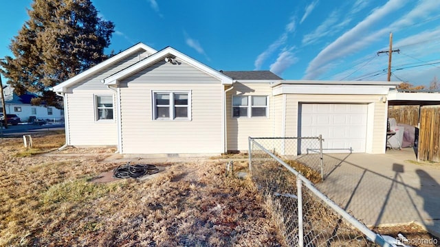 single story home with a garage