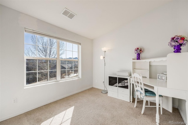 office area with visible vents, baseboards, and carpet flooring