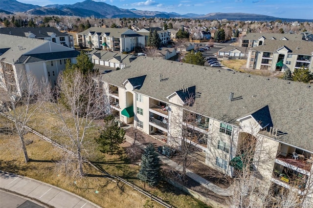 aerial view featuring a mountain view and a residential view