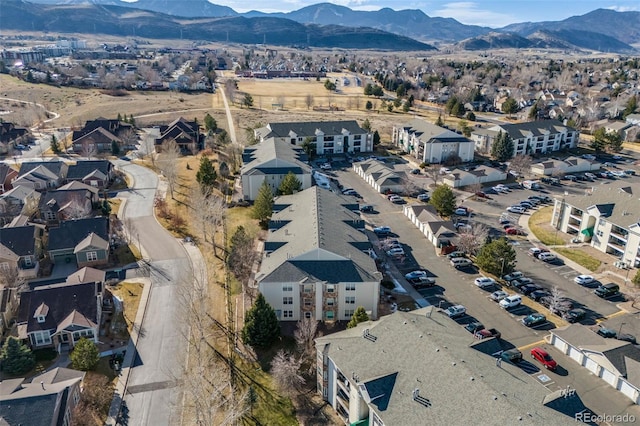 drone / aerial view with a residential view and a mountain view