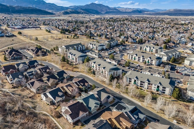 bird's eye view with a residential view and a mountain view