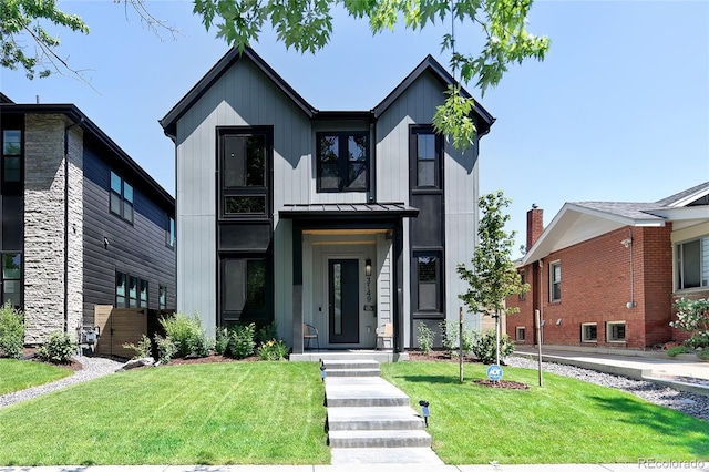 3149 W 35th Ave, Denver, CO 80211 - view of front of house with a standing seam roof, a metal roof, and a front yard
