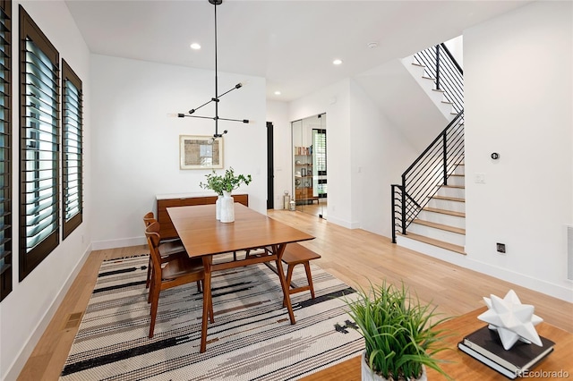 3149 W 35th Ave, Denver, CO 80211 - dining space with light wood-type flooring, stairway, and recessed lighting