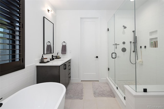 3149 W 35th Ave, Denver, CO 80211 - bathroom with a freestanding bath, vanity, a shower stall, and tile patterned floors