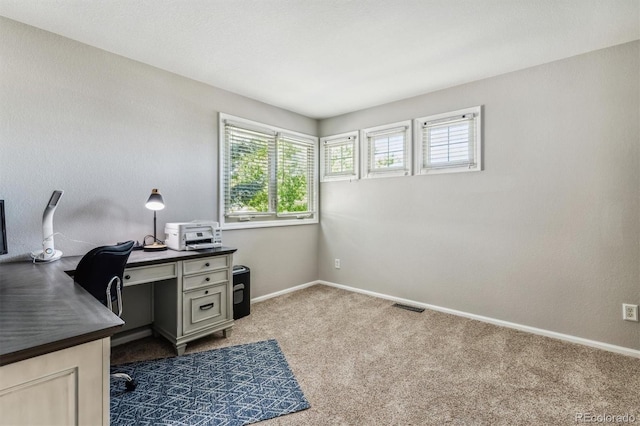 view of carpeted office space