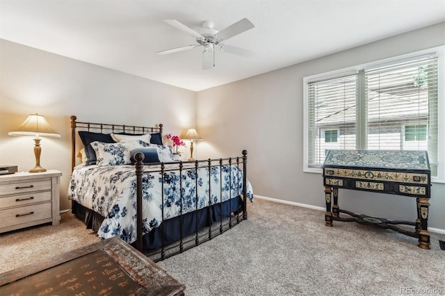 bedroom featuring ceiling fan and light colored carpet