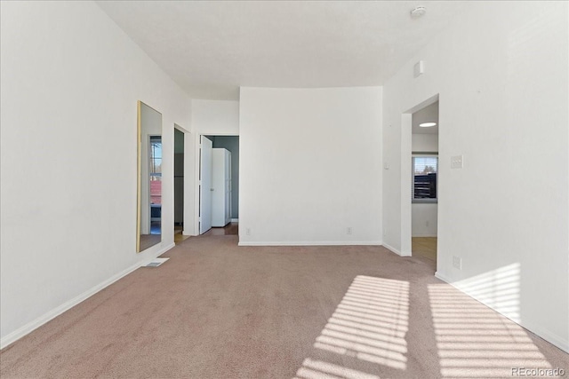 3300 W 2nd Ave, Denver, CO 80219 - carpeted empty room with a smoke detector and baseboards