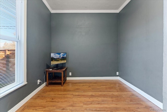 3300 W 2nd Ave, Denver, CO 80219 - unfurnished room featuring ornamental molding and light wood finished floors