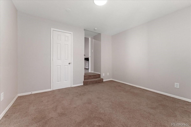 3300 W 2nd Ave, Denver, CO 80219 - carpeted empty room featuring baseboards