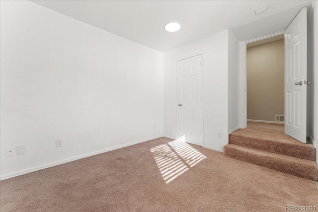 3300 W 2nd Ave, Denver, CO 80219 - carpeted empty room with baseboards and a smoke detector
