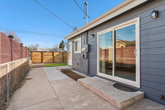 3300 W 2nd Ave, Denver, CO 80219 - view of home's exterior with a fenced backyard and a patio area