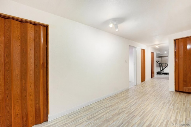 empty room featuring light hardwood / wood-style floors