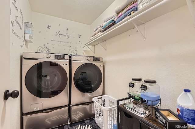 laundry room with washer and dryer