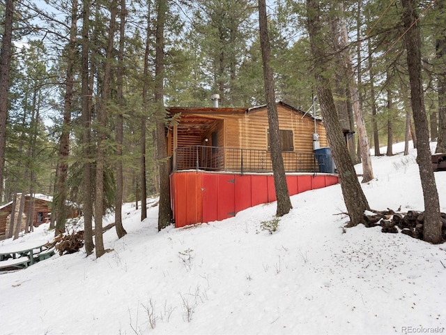 view of snow covered property