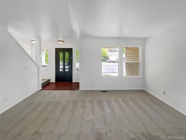 12550 Eastlake Dr, Thornton, CO 80241 - carpeted foyer entrance featuring baseboards