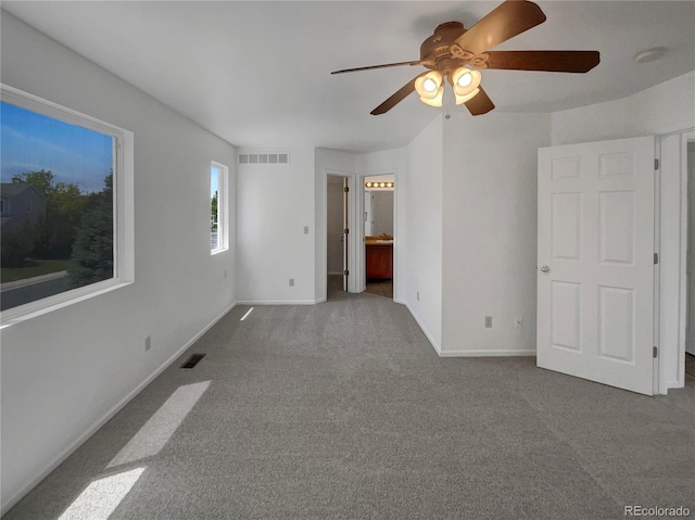 12550 Eastlake Dr, Thornton, CO 80241 - unfurnished bedroom with carpet, baseboards, ensuite bath, and ceiling fan