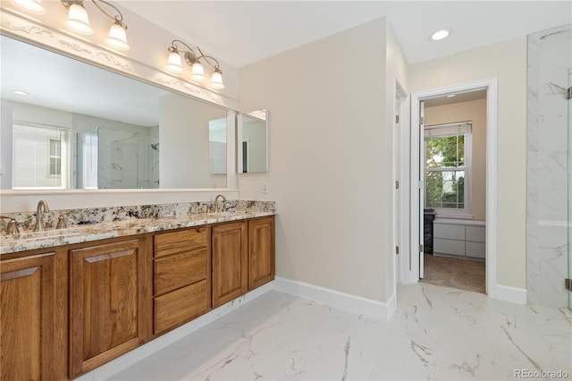 1774 Spring Water Pl, Highlands Ranch, CO 80129 - full bath with a marble finish shower, double vanity, baseboards, marble finish flooring, and recessed lighting