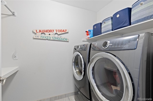 1774 Spring Water Pl, Highlands Ranch, CO 80129 - laundry area with washer and clothes dryer