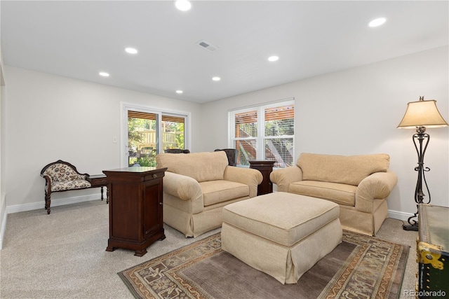 1774 Spring Water Pl, Highlands Ranch, CO 80129 - living area featuring recessed lighting, light colored carpet, and baseboards