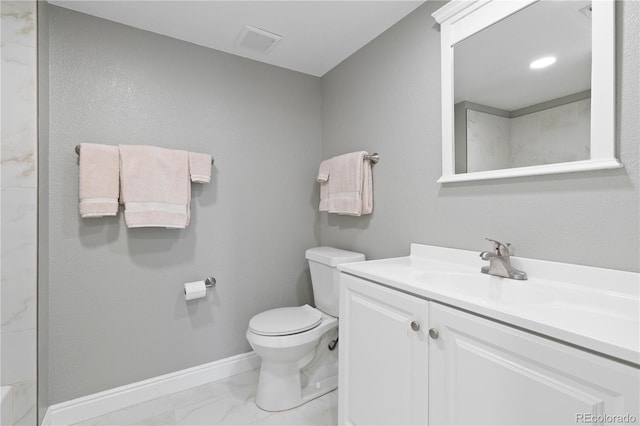 1774 Spring Water Pl, Highlands Ranch, CO 80129 - bathroom with marble finish flooring, toilet, vanity, and baseboards