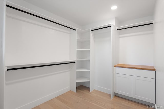 spacious closet featuring light wood-type flooring