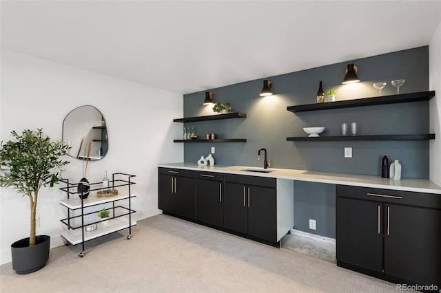 bar featuring light colored carpet and sink