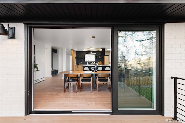 entrance to property featuring a baseboard radiator