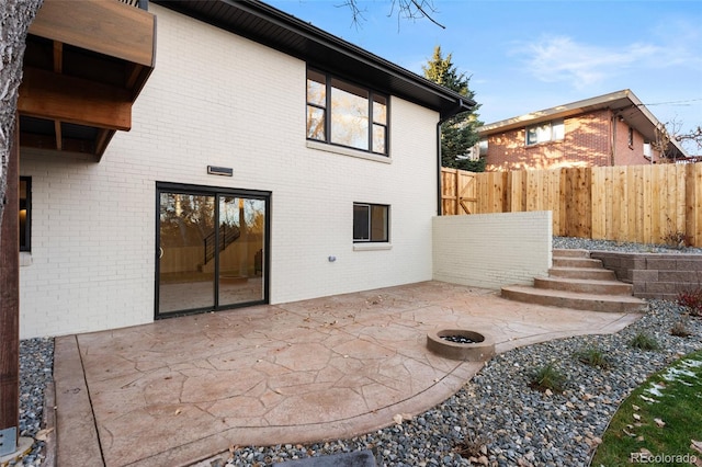 back of house with a patio area