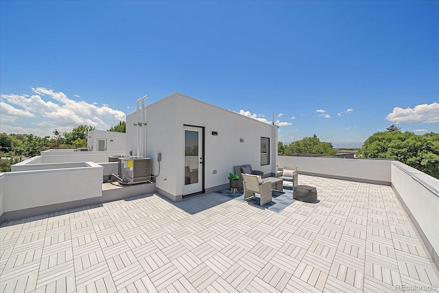 rear view of property with a patio area and cooling unit