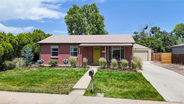 1741 W 55th Pl, Denver, CO 80221 - ranch-style home with brick siding, driveway, and roof with shingles