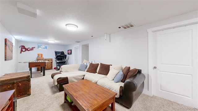 1741 W 55th Pl, Denver, CO 80221 - living room featuring light colored carpet and a textured ceiling