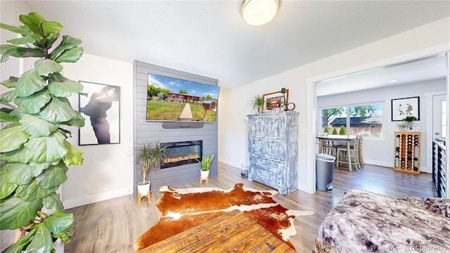 1741 W 55th Pl, Denver, CO 80221 - living area with a large fireplace and wood finished floors