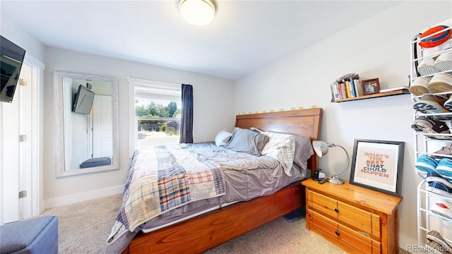 1741 W 55th Pl, Denver, CO 80221 - bedroom with carpet flooring and baseboards