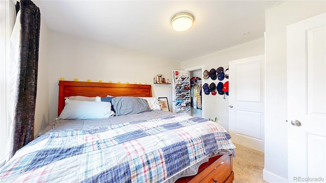1741 W 55th Pl, Denver, CO 80221 - carpeted bedroom featuring a walk in closet