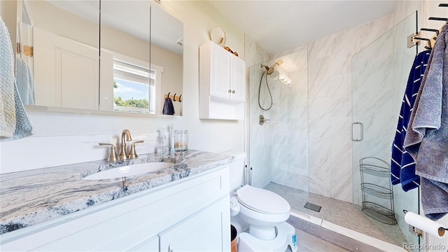 1741 W 55th Pl, Denver, CO 80221 - full bathroom featuring a stall shower and vanity