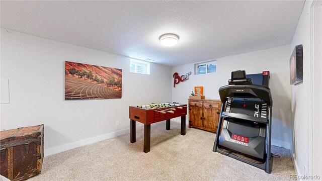 1741 W 55th Pl, Denver, CO 80221 - game room featuring carpet floors and a textured ceiling
