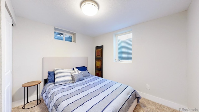 1741 W 55th Pl, Denver, CO 80221 - carpeted bedroom featuring baseboards
