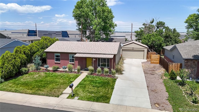 1741 W 55th Pl, Denver, CO 80221 - single story home with brick siding, a garage, and roof with shingles