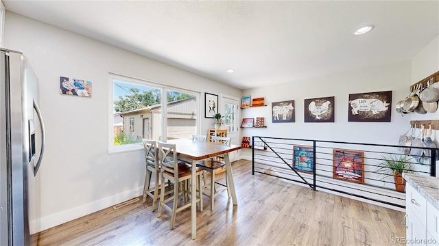 1741 W 55th Pl, Denver, CO 80221 - dining area with light wood-type flooring and recessed lighting