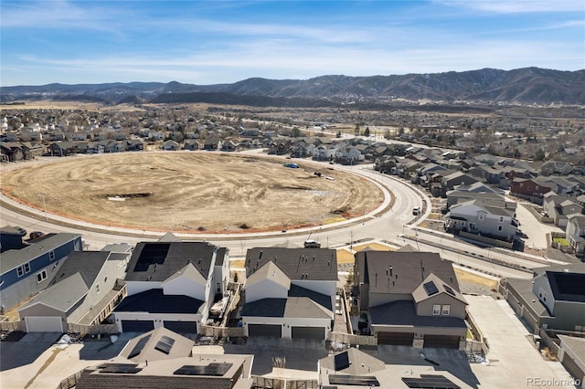 bird's eye view with a residential view and a mountain view