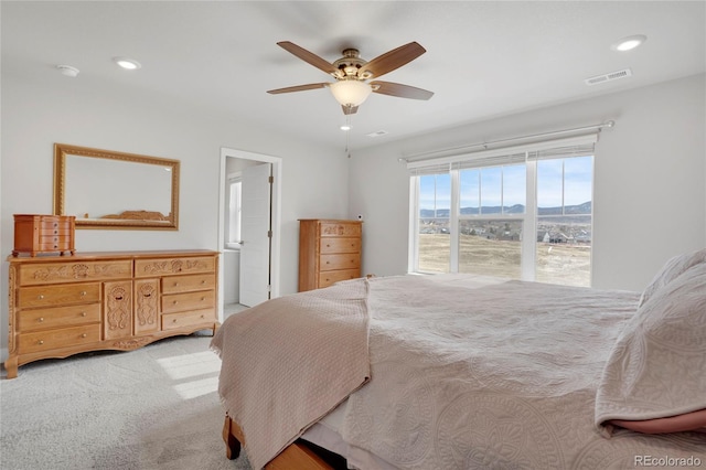 carpeted bedroom featuring visible vents, a ceiling fan, and recessed lighting