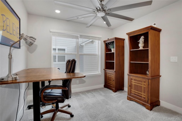 home office with a ceiling fan, recessed lighting, light carpet, and baseboards