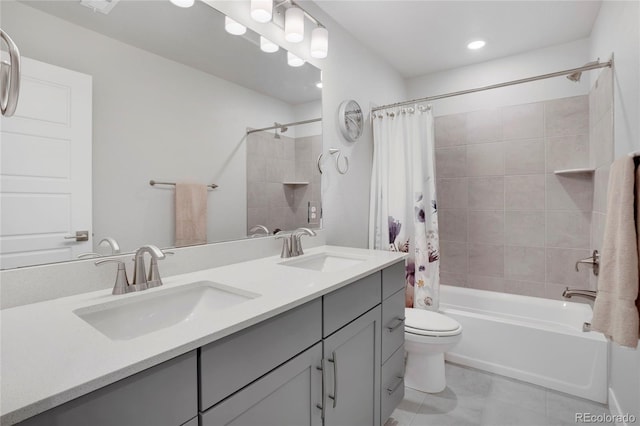 full bathroom with toilet, double vanity, shower / bath combo with shower curtain, and a sink