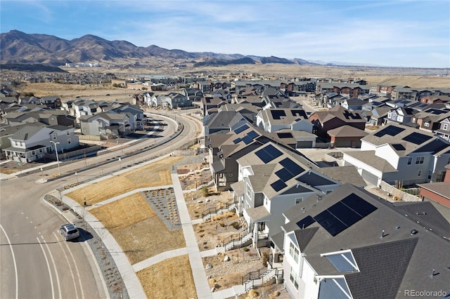 drone / aerial view with a residential view and a mountain view