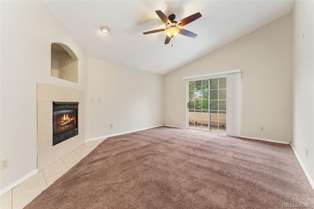 unfurnished living room featuring ceiling fan, a fireplace, light carpet, and high vaulted ceiling