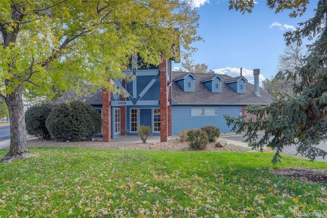 view of home's exterior with a lawn