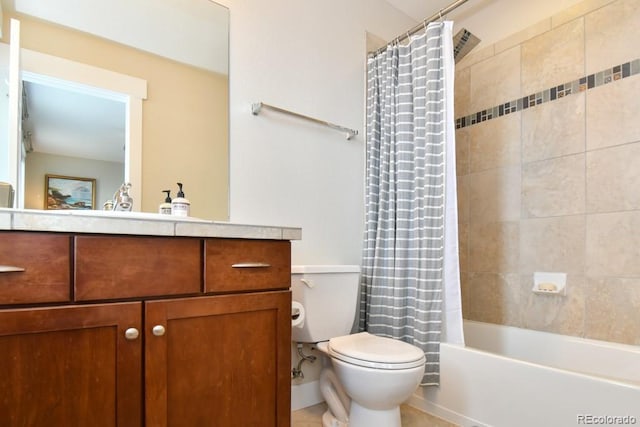 full bathroom featuring shower / bath combo, vanity, tile patterned flooring, and toilet