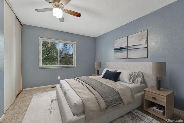 17390 E Greenwood Cir, Aurora, CO 80013 - carpeted bedroom featuring baseboards and a ceiling fan