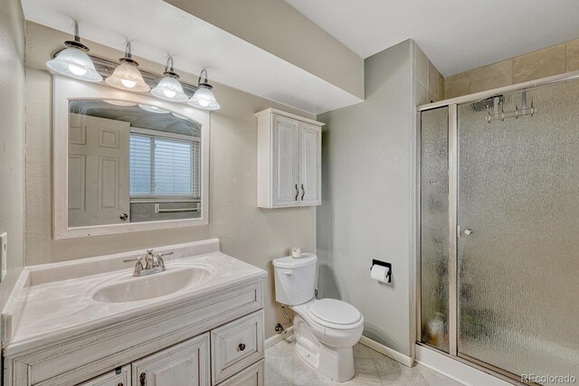 17390 E Greenwood Cir, Aurora, CO 80013 - full bath with a shower stall, toilet, and vanity
